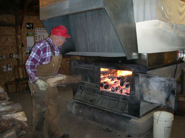 Woodstove boils syrup.