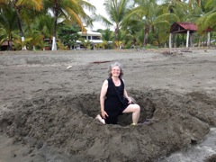 Connie plays in the mud.